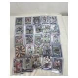 Group of sleeved NFL cards majority Texans see