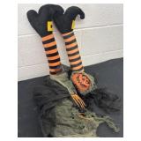 Trunk witch with hanging Halloween pumpkin man