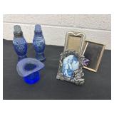 Three miniature picture frames with glass hat,