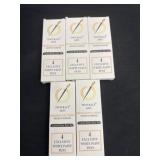 Five boxes of four white paint pens