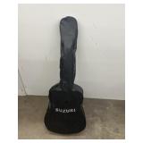 Suzuki guitar in case
