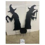 Halloween Witch steaks with cauldron yard decor