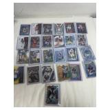 Group of sleeved NFL cards, Chargers Broncos and