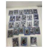 Group of sleeved NFL cards ravens, raiders see