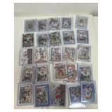 Group of sleeved, NFL cards, majority browns