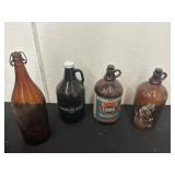 Group of Vintage Glass Clorox Bottles and Growler