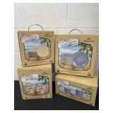 Four boxes of new plates, bowls, and cups