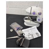 Mini electric sewing machine