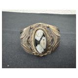 ornate sterling silver cuff bracelet featuring a
