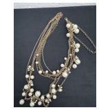Multi strand faux pearl necklace