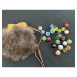 Vintage marbles with fur pouch