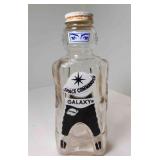 1953 Galaxy Foods Orange Syrup Spaceman Glass Bank