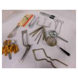 kitchen tools-measuring spoons; jar opener