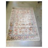 Collins Traditional area rug measures 5