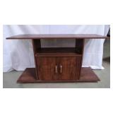 particle board TV stand has stains, water