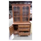 wood 2 piece hutch with glass panels and