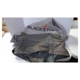 Blackstone grill cover. It has holes on the bottom