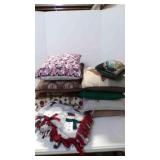 10 throw pillows, 1 fleece tie throw blanket