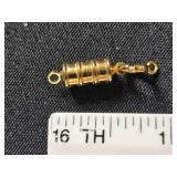 Gold tone magnetic latch