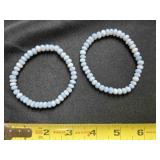 2 blue bracelets; possibly Angelite