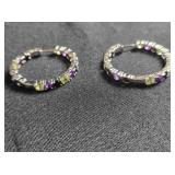 Silver tone hoop earrings w/mult-color stones