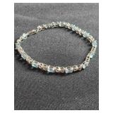 Sterling Silver bracelet w/light blue gemstones
