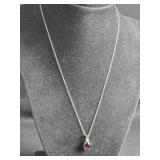 Sterling Silver necklace w/ruby colored gemstone