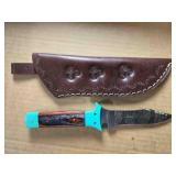 Clip point hunting knife; 8" overall 4" blade