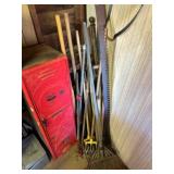 Assorted hand tools- rake, tillers, clamps, shovel