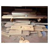 Assorted wood & boards in south shop room
