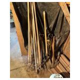 Assorted yard tools- shovels, axes, rake, hoes