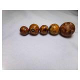 Interesting Clay or Stone Marbles - One Glow Green