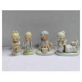 4 Precious Moments figurines