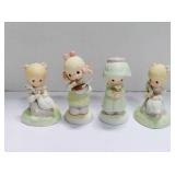 4 Precious moments figurines
