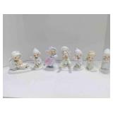 7 Precious Moments figurines
