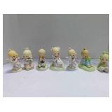 7 Precious Moments figurines