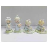 4 Precious Moments figurines