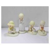 4 Precious moments figurines