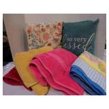 3 towels; 2 pillows; 1 baby blanket