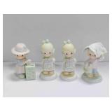 4 Precious moments figurines