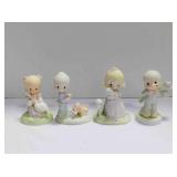 4 Precious Moments figurines