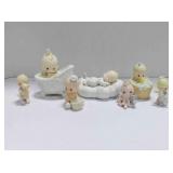 7 Precious Moments figurines
