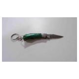 Miniature Damascus steel folding pocket knife