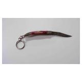 Damascus mini pocket knife with a wood handle