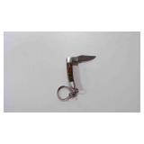 Miniature Damascus steel folding knife w/keychain.