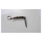 Miniature Damascus steel folding pocket knife