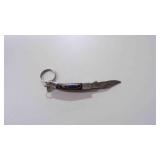 Miniature Damascus steel folding pocket knife