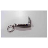 Miniature Damascus steel folding knife w/keychain.