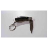 Miniature Damascus steel folding pocket knife