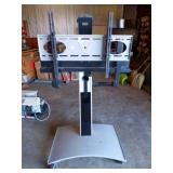 portable TV stand on rollers